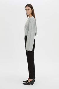 Side view CAMILLA AND MARC relaxed Peretti Long Sleeve Tee in grey marle with straddle-stitch seams.