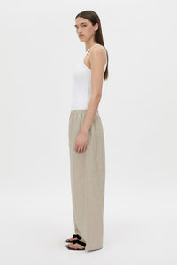 Side view CAMILLA AND MARC wide-leg Phostre Relaxed Pant in sand with a mid‑rise fit.