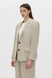 Cropped view CAMILLA AND MARC Phostre Linen Relaxed Blazer in sand soft tailoring fabrication.