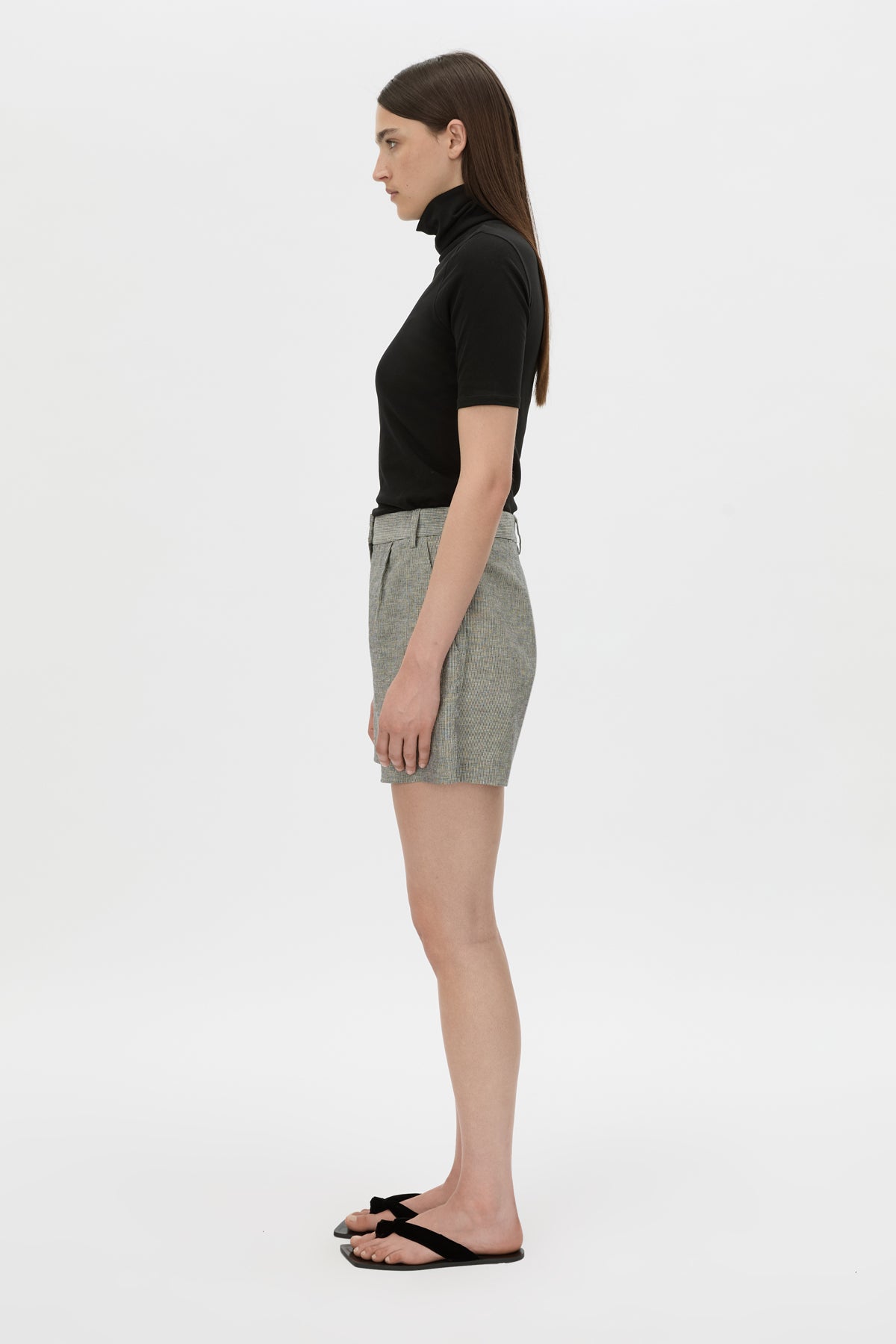 Side view CAMILLA AND MARC mid-rise Phostre Tailored Mini Short in black and white stripe with a fixed waistband.