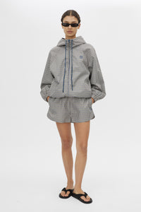 Front view CAMILLA AND MARC Pierce Check Anorak in Birch Check with hooded design and embroidered monogram.