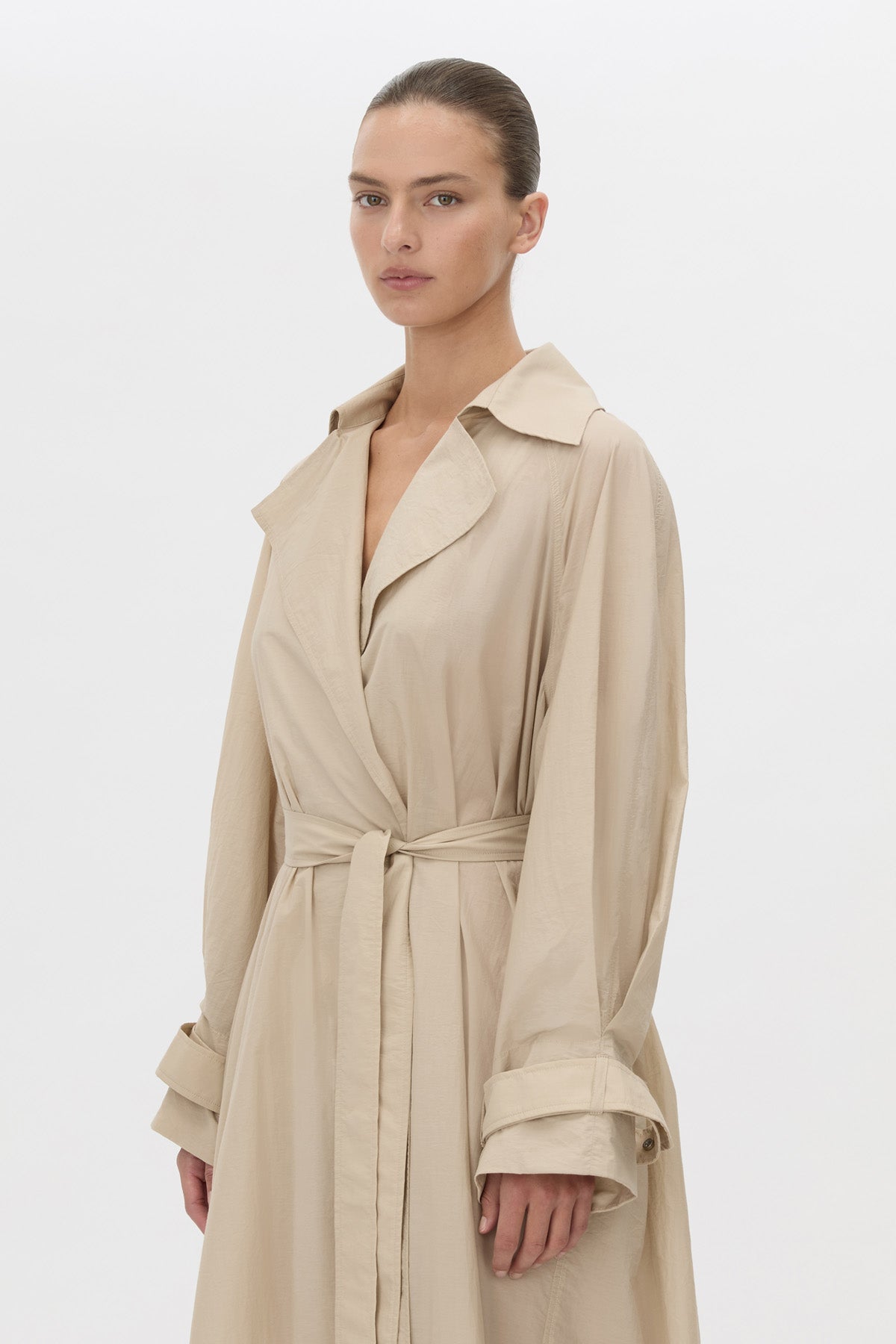 Cropped view CAMILLA AND MARC Pietro Full Length Sheer Trench in stone with raglan sleeves.