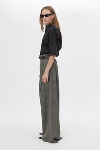 Side view CAMILLA AND MARC Pique Short Sleeve Shirt in Black with a boxy silhouette and French‑cuff sleeves.