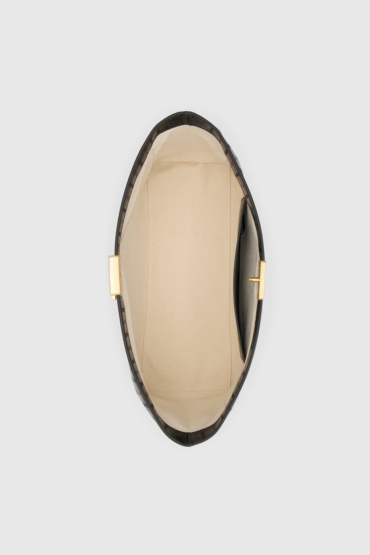 Top view CAMILLA AND MARC Poppy Eel Clutch in Black eel‑embossed leather with ribbed gold hardware.