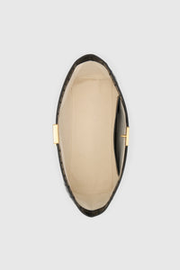 Top view CAMILLA AND MARC Poppy Eel Clutch in Black eel‑embossed leather with ribbed gold hardware.