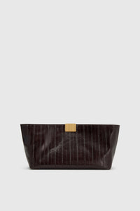 Front ghost view CAMILLA AND MARC Poppy Eel Clutch in Burgundy eel‑embossed leather with ribbed gold hardware.