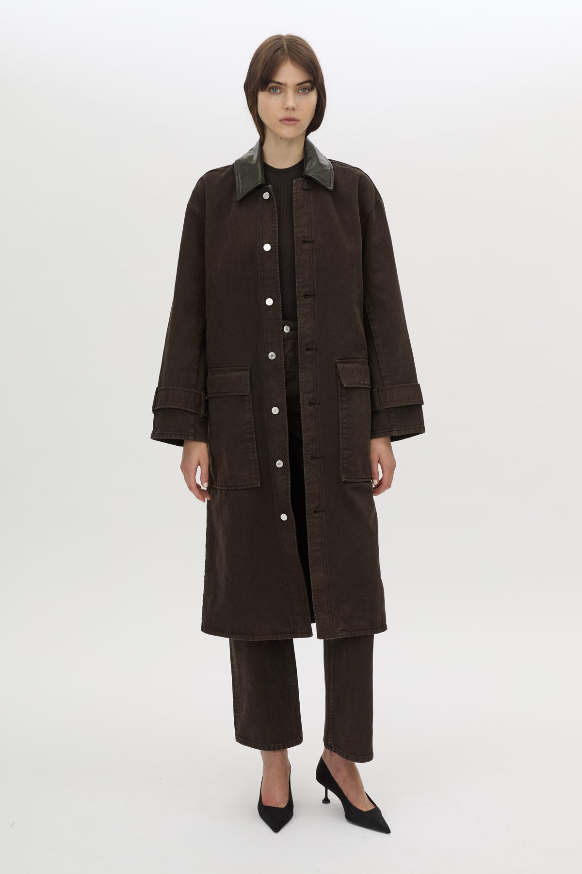 Styled view CAMILLA AND MARC Raha crew neck rib bodysuit in espresso brown with cap sleeve and ribbed neckline.
