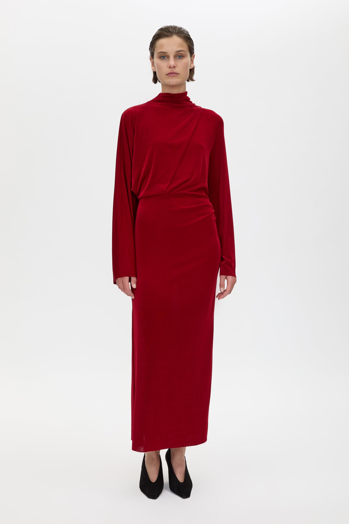 Front view CAMILLA AND MARC Ravine Midi Dress in Cherry Red with asymmetric draped neckline.