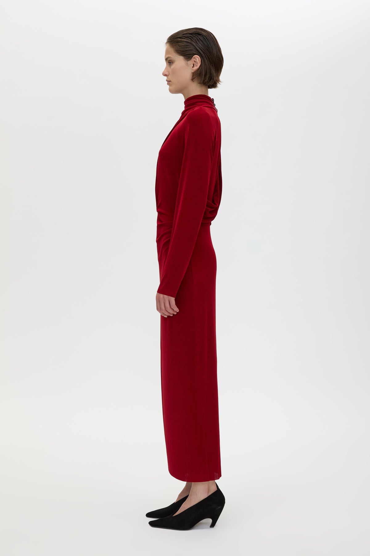 Side view CAMILLA AND MARC Ravine Midi Dress in Cherry Red with asymmetric draped neckline.