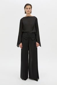 Front styled view CAMILLA AND MARC Rene Wide-Leg Pant in black with a removable folded belt and georgette shorts.
