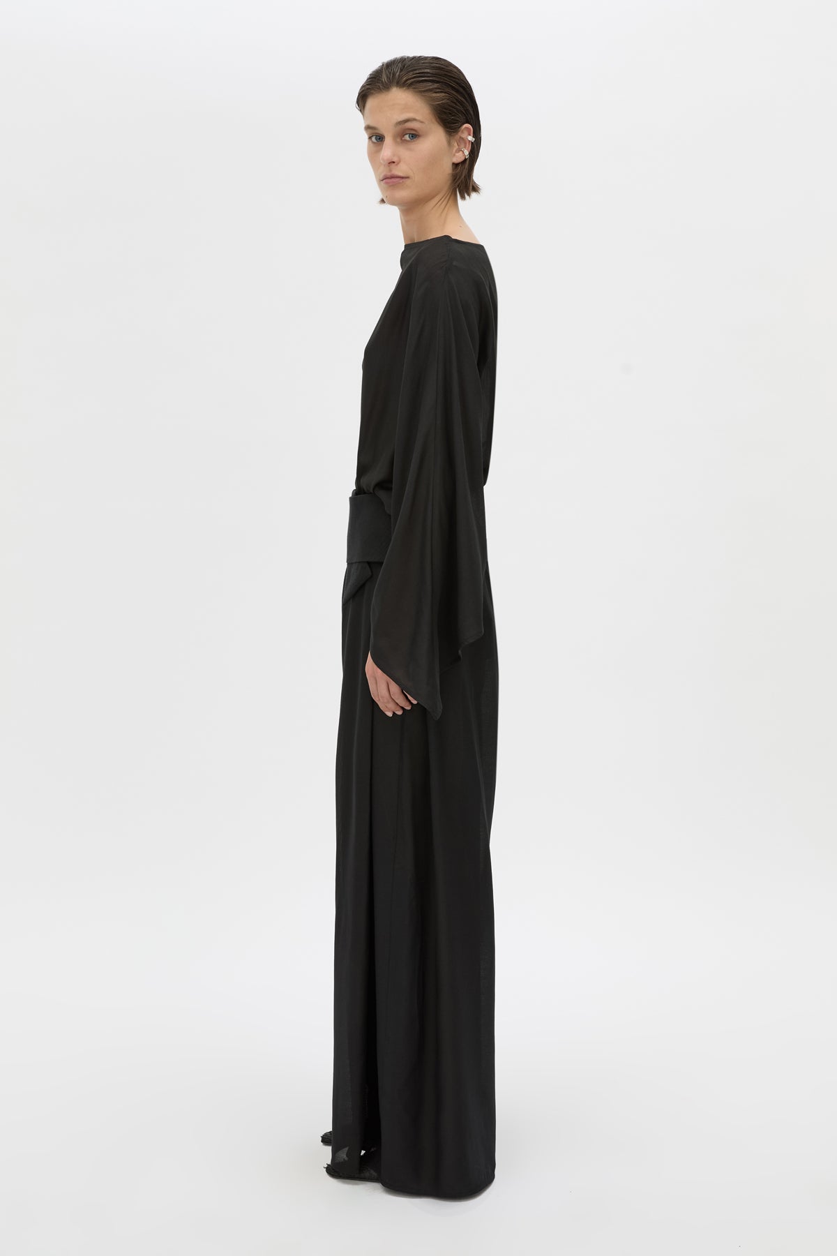 Side view CAMILLA AND MARC long-sleeve Rene Draped Top in black with a boat neckline.