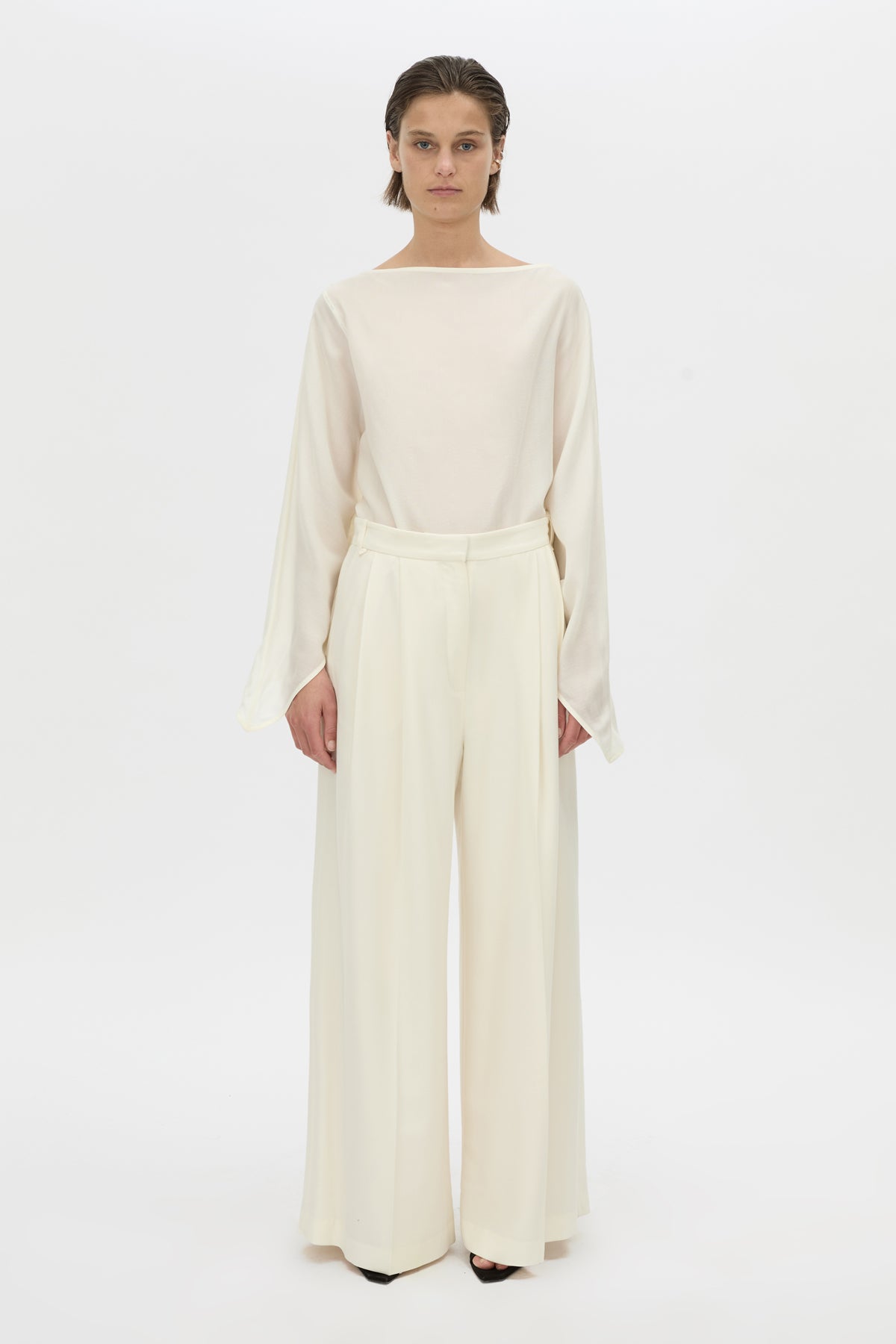 Front view CAMILLA AND MARC long-sleeve Rene Draped Top in cream with a boat neckline.