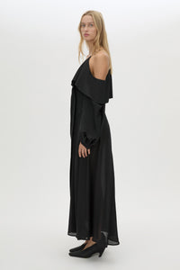 Side view CAMILLA AND MARC long-sleeve Rene Maxi Dress in black with exposed shoulder sleeves.