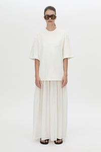 Front view CAMILLA AND MARC Romy Contrast Maxi Dress in soft white with upper cotton tee‑shirt and sheer voile extension.