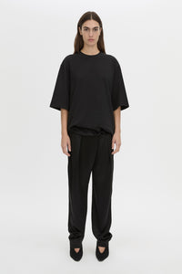 Front view CAMILLA AND MARC Romy Oversized Tee in black with tubular ribbed bound neckline.