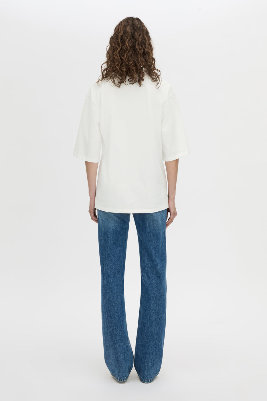 Back view CAMILLA AND MARC Romy Oversized Tee in white with tubular ribbed bound neckline.