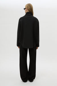 Back view CAMILLA AND MARC Salem Bonded Fleece Jacket in black with high collared neckline.