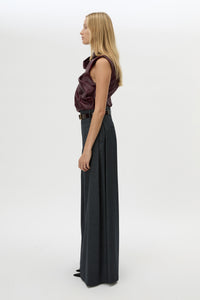 Side view CAMILLA AND MARC Sana Tailored Top in Burgundy with draped detailing and a high neckline.
