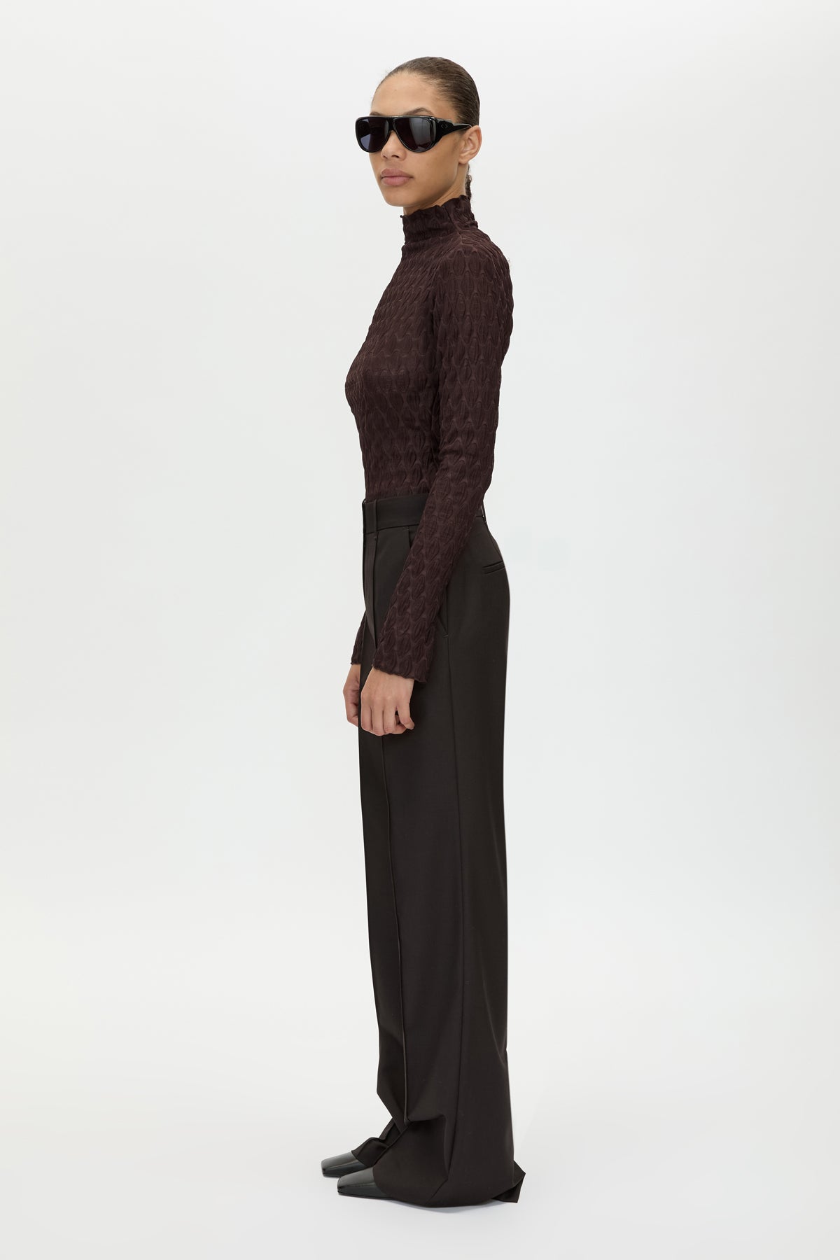 Side view CAMILLA AND MARC Saxony High Waisted Pintuck Pant in Espresso Pindot featuring a tailored silhouette.