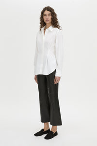 Front-styled-2 view CAMILLA AND MARC Shari Collared Shirt in white with concealed front corozo button placket.