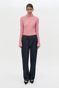 Front styled view CAMILLA AND MARC Sissil Top in Powder Pink jersey with long sleeves and funnel neck.