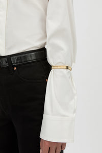 Front View - CAMILLA AND MARC Sleeve Monogram garter pair in gold. Worn on the arm to perfectly bunch up any sleeve.
