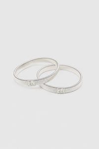Ghost View - CAMILLA AND MARC Sleeve Monogram garter pair in silver. Wear with your favourite shirt, blazer, or coat.