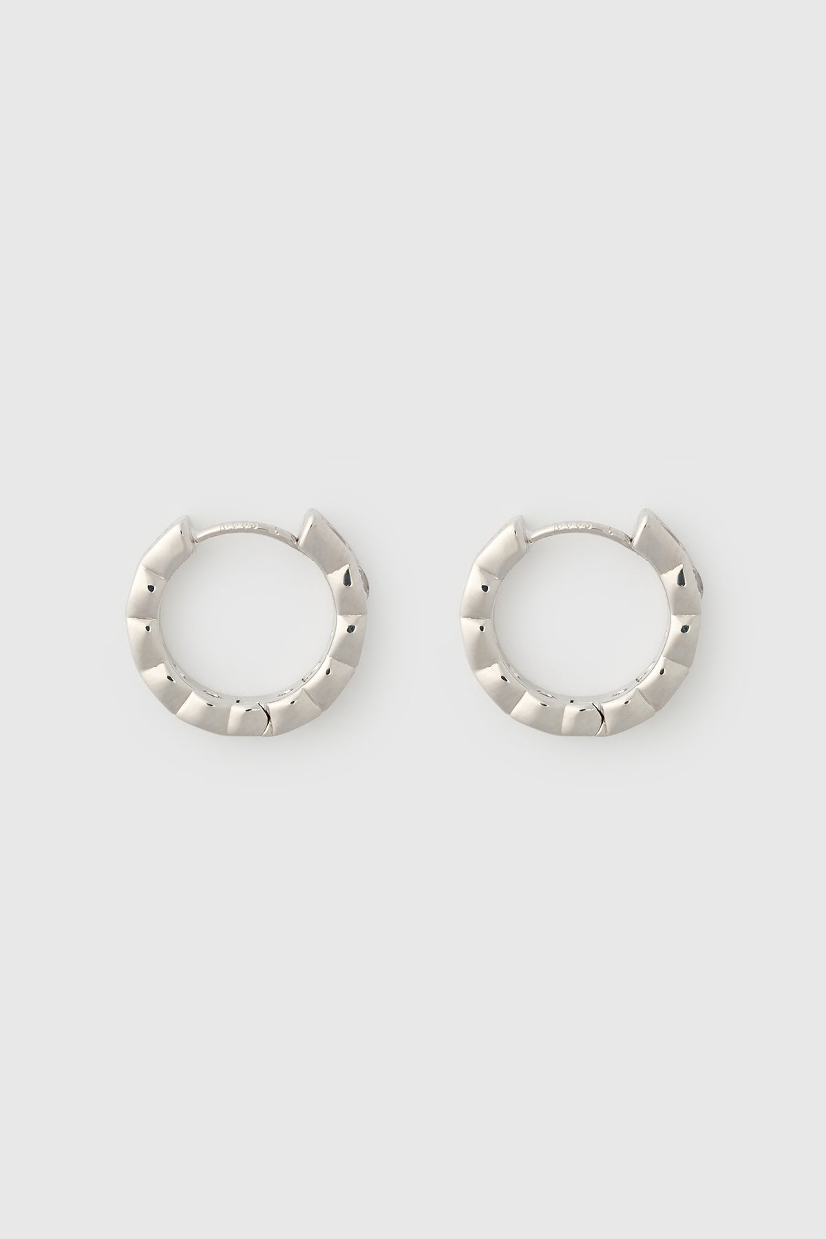Side view CAMILLA AND MARC Sloane Huggies in Silver rhodium plating.