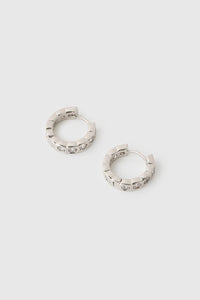 Three-quarter view CAMILLA AND MARC Sloane Huggies in Silver rhodium plating.