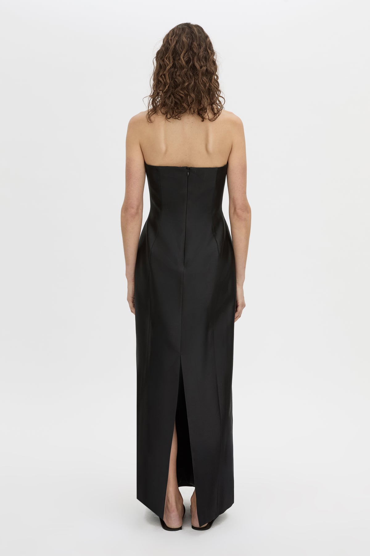 Back view CAMILLA AND MARC strapless Sona Maxi Dress in black with structured internal bodice.