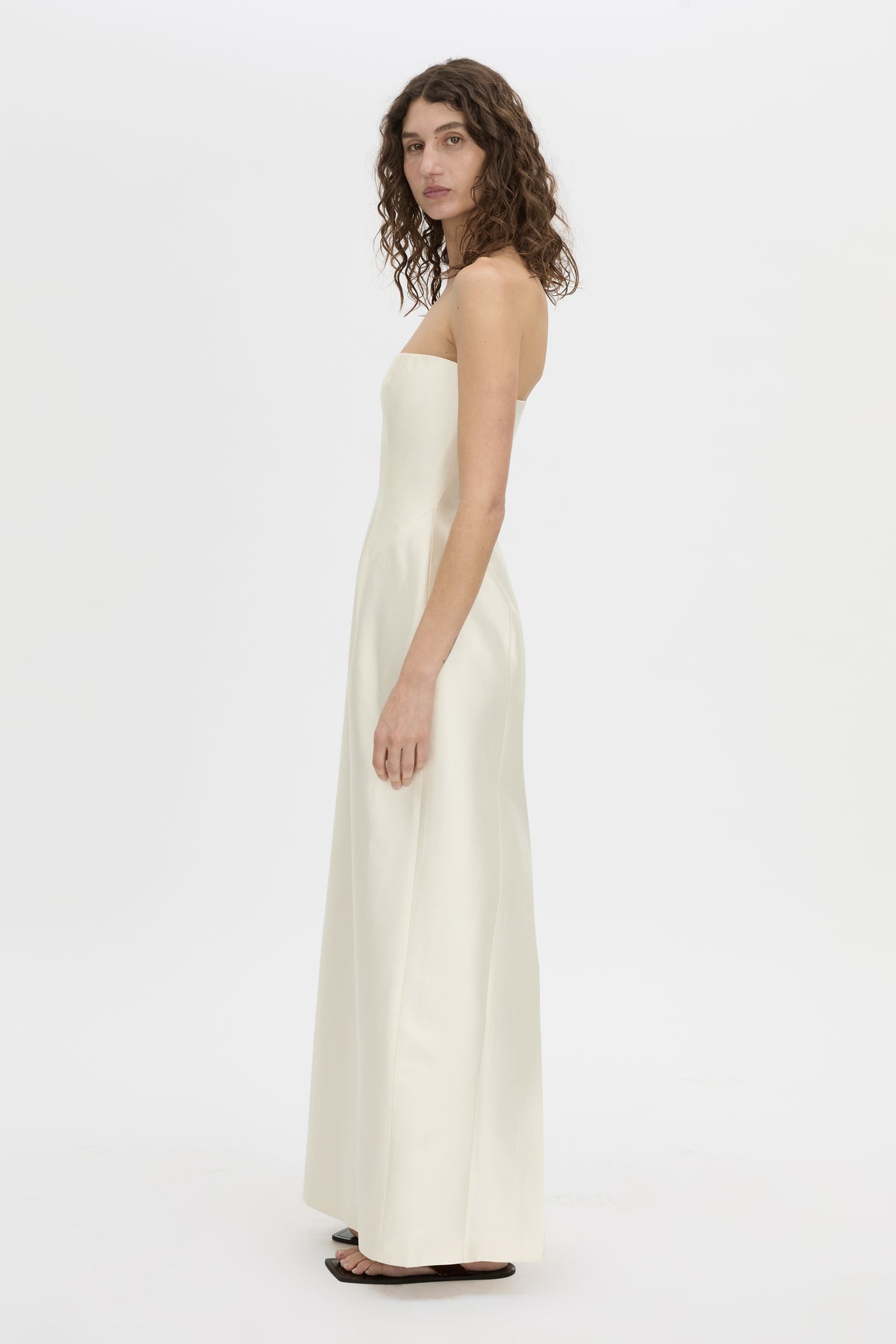 Side view CAMILLA AND MARC strapless Sona Maxi Dress in cream with structured internal bodice.