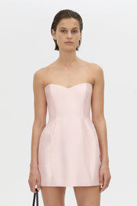 Cropped view CAMILLA AND MARC strapless Sona Mini Dress in ice pink with structured internal bodice.