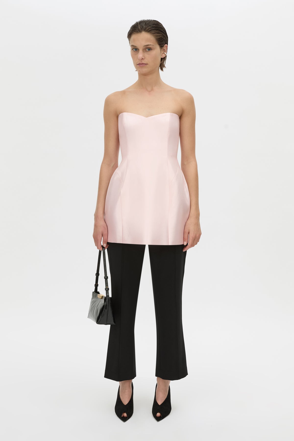 Front-styled view CAMILLA AND MARC strapless Sona Mini Dress in ice pink with structured internal bodice.