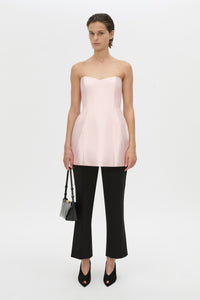 Front-styled view CAMILLA AND MARC strapless Sona Mini Dress in ice pink with structured internal bodice.