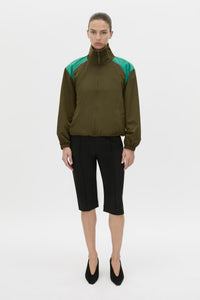 Front-styled view CAMILLA AND MARC Storm Colour Block Anorak in khaki emerald with contrast shoulder panels and a funnel neckline.