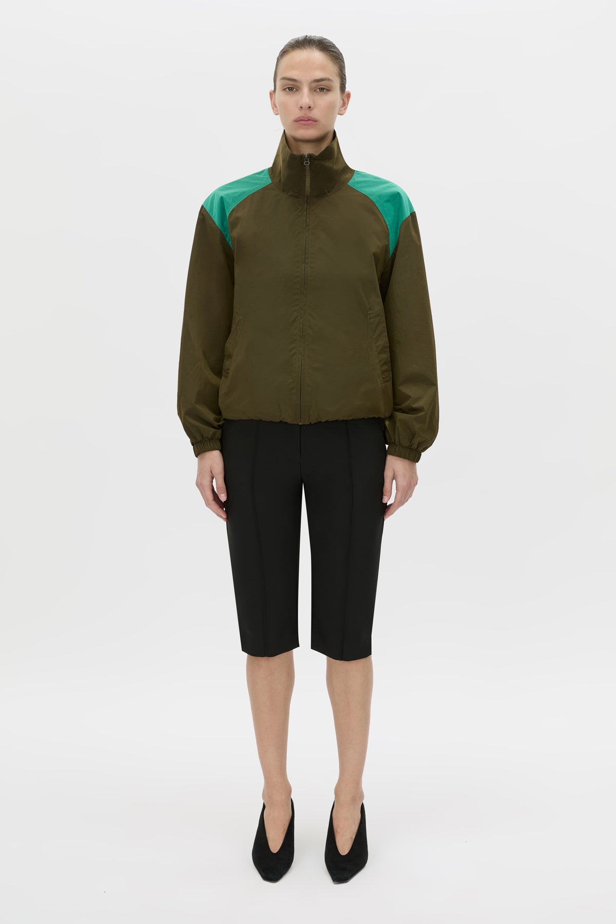 Front view CAMILLA AND MARC Storm Colour Block Anorak in khaki emerald with contrast shoulder panels and a funnel neckline.