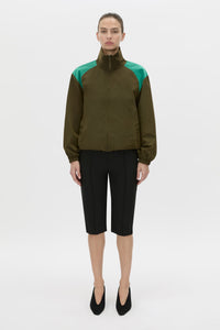 Front view CAMILLA AND MARC Storm Colour Block Anorak in khaki emerald with contrast shoulder panels and a funnel neckline.