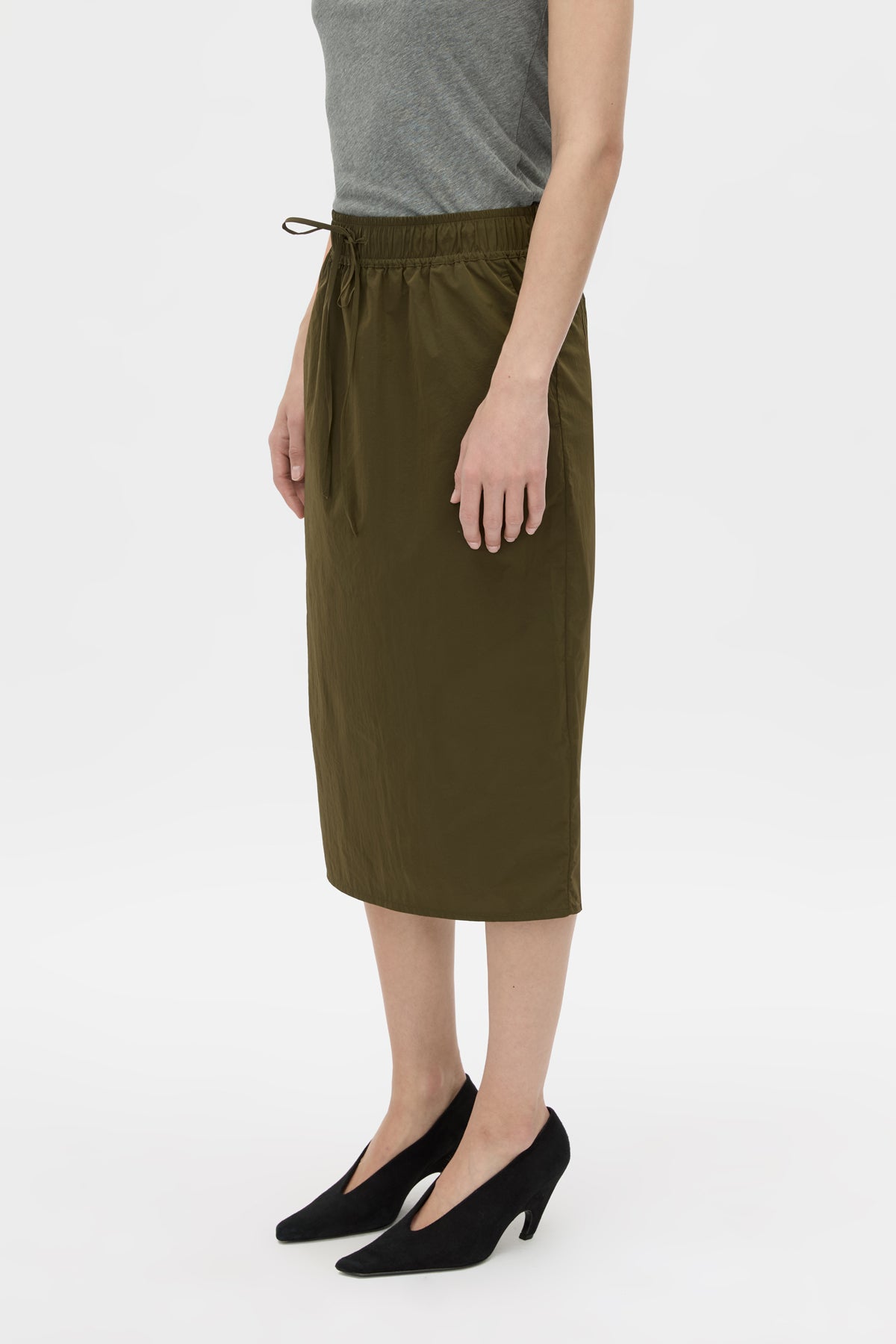 Cropped view CAMILLA AND MARC Storm Midi Skirt in khaki with an elasticated waistband, slanted side pockets and a back vent.