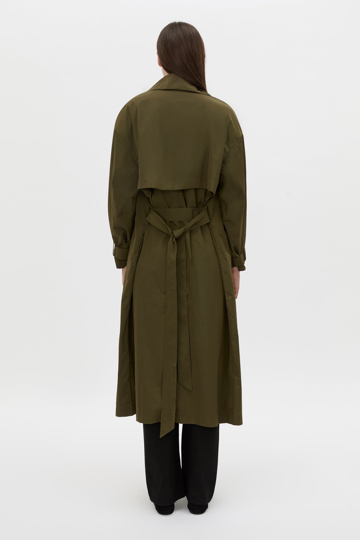 Back view CAMILLA AND MARC Storm Trench Coat in khaki with concealed snap fastenings, in seam pockets and a self tie belt with sleeve straps.