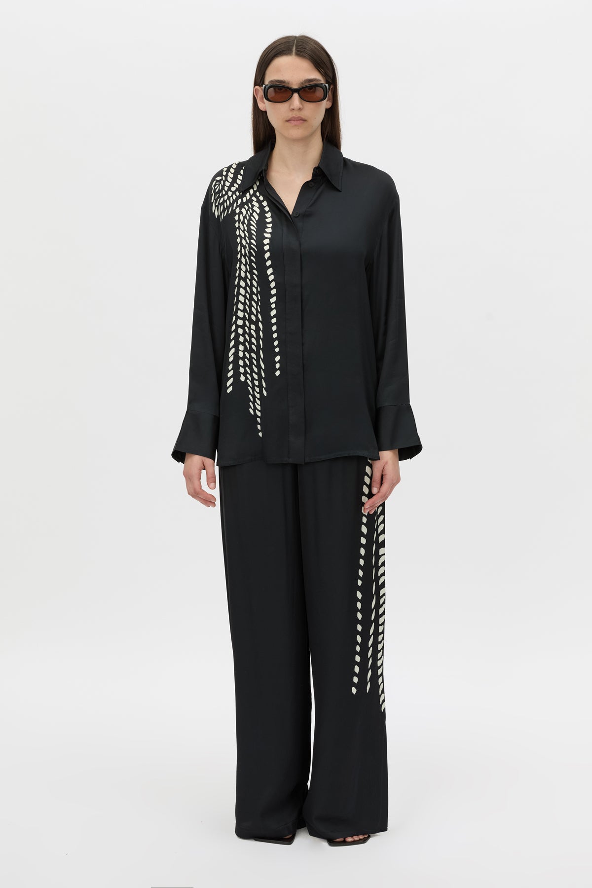 Front-styled view CAMILLA AND MARC Suri Long Sleeve Shirt in black suri print.