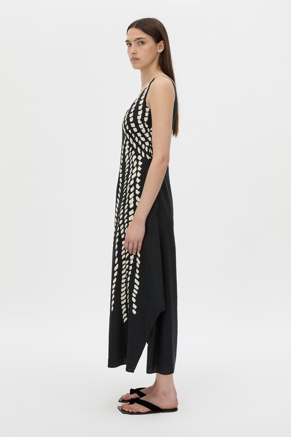 Side view CAMILLA AND MARC Suri Midi Dress in black Suri print with a scooped neckline.