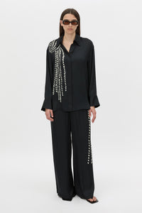 Front view CAMILLA AND MARC Suri Wide-Leg Pant in black suri print with mid‑rise fit.