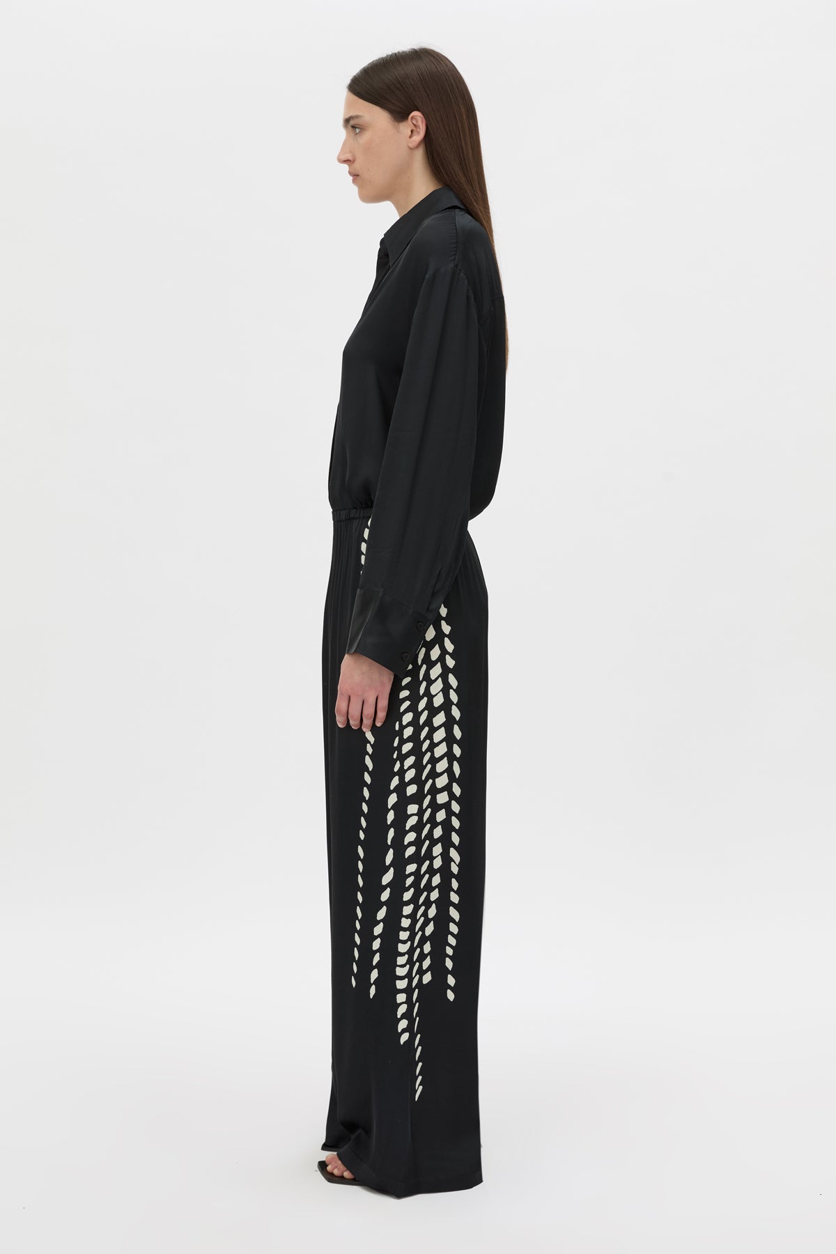Side view CAMILLA AND MARC Suri Wide-Leg Pant in black suri print with mid‑rise fit.