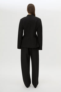 Back view CAMILLA AND MARC Tala Fitted Collarless Blazer in Black with single‑breasted closure, curved sleeves 