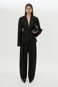 Front view CAMILLA AND MARC Tala Double Pleat Barrel Leg Pant in Black with pressed tapered legs.