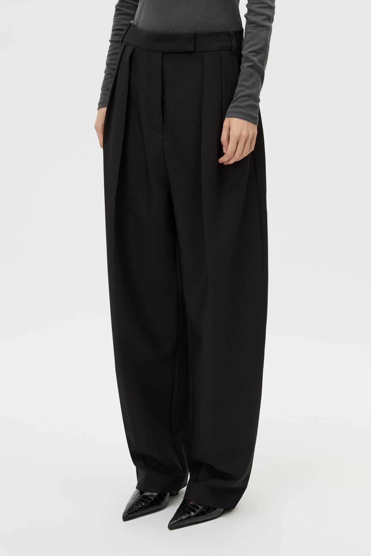 Cropped view CAMILLA AND MARC Tala Double Pleat Barrel Leg Pant in Black with pressed tapered legs.