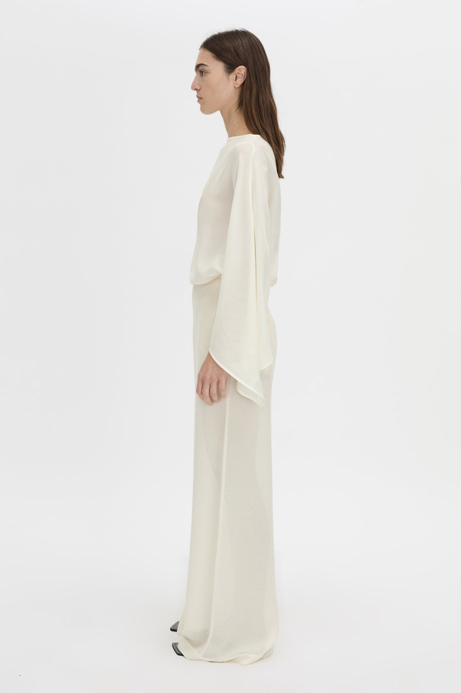 Side view CAMILLA AND MARC high-waisted Tessara Pant in cream.