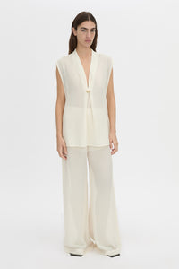 Front-styled view CAMILLA AND MARC Tessara Relaxed Top in cream with cinched V‑neckline.