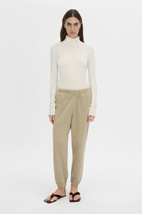Front view CAMILLA AND MARC Thome Emb Track Pant in garment-dyed oyster.