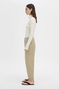 Side view CAMILLA AND MARC Thome Emb Track Pant in garment-dyed oyster.